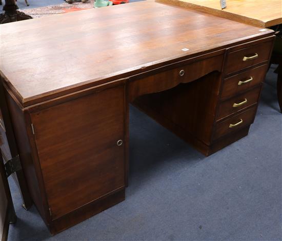 An Art Deco mahogany and oak partners desk W.148cm